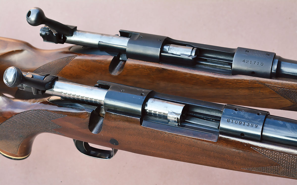 The original Winchester pre-’64 Model 70 (top) was a hugely respected rifle and featured solid machined steel, control-round feeding and boasted of high quality, while the post-’64 Model 70 (bottom) was a push-feed system and had many other changes in design and lower quality.